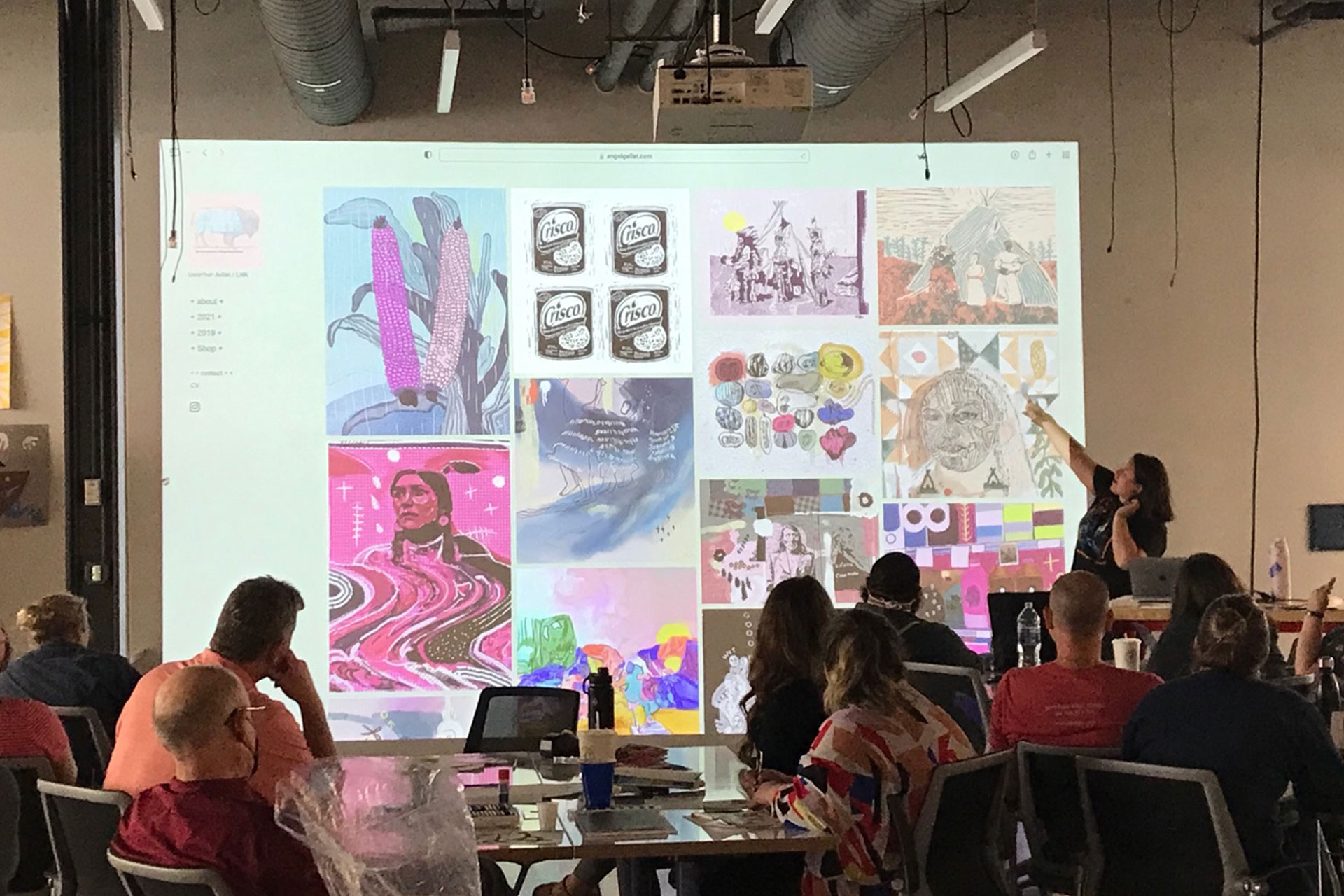 An Art TEAMs cohort attends an artist talk from visiting artist Angel Gellar during the Summer 2022 Workshop.